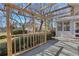 View of a patio featuring a wooden pergola, offering an inviting outdoor space with partial sun coverage at 1006 Walnut Dr, Lawrenceville, GA 30044