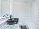 Bathroom featuring vessel sink atop granite counters and tile tub surround at 1877 Glenmar Dr, Decatur, GA 30032