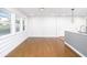 Bright dining area with hardwood floors, shiplap accent wall, and natural light at 1877 Glenmar Dr, Decatur, GA 30032