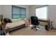 Bedroom featuring carpet, a gray paneled bed, a large window, and a desk at 203 Glenrise Ct, Woodstock, GA 30188