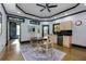 A charming dining area features a round table, rug, and adjacent kitchenette at 203 Glenrise Ct, Woodstock, GA 30188