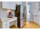 Modern kitchen with stainless steel refrigerator and matching red stand mixer at 203 Glenrise Ct, Woodstock, GA 30188