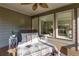 Inviting screened porch with views into the main bedroom at 203 Glenrise Ct, Woodstock, GA 30188