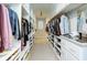 Spacious walk-in closet with custom shelving for optimal storage at 203 Glenrise Ct, Woodstock, GA 30188