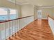 Well-lit hallway with hardwood floors and view of the exterior at 3628 Princeton Ave, Atlanta, GA 30337