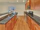 Modern kitchen with granite countertops, stainless steel appliances, and hardwood flooring at 3628 Princeton Ave, Atlanta, GA 30337