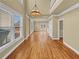 Open-concept living room featuring hardwood floors, large windows, and bright natural light at 3628 Princeton Ave, Atlanta, GA 30337