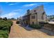 Backyard view featuring a deck, patio, and landscaped yard at 112 Bluestone Ct, Acworth, GA 30101