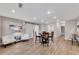 Basement includes a dinning area with seating and an entertainment area with white sofas at 112 Bluestone Ct, Acworth, GA 30101