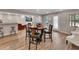 Basement featuring bar and entertainment area with fireplace and a dinning table at 112 Bluestone Ct, Acworth, GA 30101