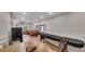 Spacious finished basement with wood flooring, dining table and bonus living room at 112 Bluestone Ct, Acworth, GA 30101