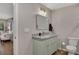 Bright bathroom with tile floors, granite sink top and decorative vanity at 112 Bluestone Ct, Acworth, GA 30101