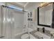 Clean bathroom features a shower-tub combo, vanity with granite countertop, and a framed mirror above at 112 Bluestone Ct, Acworth, GA 30101