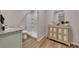 Bathroom featuring granite countertop sink with walk-in shower and decorative cabinet at 112 Bluestone Ct, Acworth, GA 30101