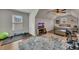 Spacious bedroom has a ceiling fan, workout area, hardwood floors and an attached bathroom at 112 Bluestone Ct, Acworth, GA 30101