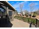 Large wooden deck overlooking the serene backyard with lush landscaping at 112 Bluestone Ct, Acworth, GA 30101