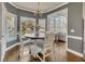 Charming dining area with a view of the landscaped yard and ample natural light at 112 Bluestone Ct, Acworth, GA 30101