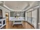 Formal dining room with stylish decor, tray ceilings, and large windows that provide natural light at 112 Bluestone Ct, Acworth, GA 30101