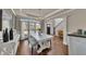 Elegant dining room featuring hardwood floors, a chandelier, and large windows with a view at 112 Bluestone Ct, Acworth, GA 30101
