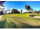 Scenic view of the golf course with lush green grass and a sand trap at 112 Bluestone Ct, Acworth, GA 30101