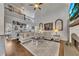 Bright living room with tall ceilings, fireplace, and open floor plan to the second story at 112 Bluestone Ct, Acworth, GA 30101