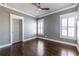 This bedroom features hardwood floors, recessed lighting, two windows with shutter blinds, and a ceiling fan at 303 Bass Se St, Atlanta, GA 30315