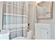 Well-maintained bathroom with a modern vanity, contemporary fixtures, and a bathtub with shower at 32 Howell Se St, Atlanta, GA 30312