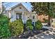 Charming front exterior features a well-maintained lawn and cozy front porch at 32 Howell Se St, Atlanta, GA 30312