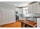 Efficient kitchen featuring white cabinets and stainless steel appliances at 32 Howell Se St, Atlanta, GA 30312