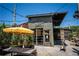 Exterior view of Ladybird restaurant featuring rustic architecture, string lights, and outdoor seating area at 32 Howell Se St, Atlanta, GA 30312