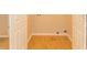 Functional laundry room featuring laminate flooring and washer hookups at 5171 Hanover St, Atlanta, GA 30349