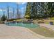 Serene backyard pool area with lounge chairs, offering a perfect spot for relaxation at 3323 Acorn Falls Dr, Marietta, GA 30062