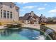 Beautiful pool and patio area with a jacuzzi, ideal for relaxation and enjoying the outdoors at 3323 Acorn Falls Dr, Marietta, GA 30062