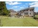 Sprawling backyard showing a pool, spa, patio area, and lush lawn, perfect for outdoor activities at 3323 Acorn Falls Dr, Marietta, GA 30062