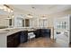 Bathroom showcasing granite countertops, double vanity, and lots of mirror space at 3323 Acorn Falls Dr, Marietta, GA 30062