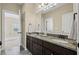 Bathroom featuring double vanity with granite counters at 3323 Acorn Falls Dr, Marietta, GA 30062