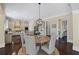 Eat-in kitchen dining area with pendant lighting and ample space for Gathering gatherings and casual meals at 3323 Acorn Falls Dr, Marietta, GA 30062