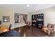 Cozy home office with hardwood floors and a view of the kitchen at 3323 Acorn Falls Dr, Marietta, GA 30062