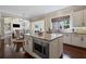 Modern kitchen island with granite countertop, stainless steel appliances, and open floorplan at 3323 Acorn Falls Dr, Marietta, GA 30062