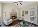 Cozy living room features a stone fireplace, vaulted ceiling and lots of natural light at 3323 Acorn Falls Dr, Marietta, GA 30062