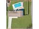 Aerial view of a home with an in-ground swimming pool and large lawn at 4554 Mountain Creek Ne Dr, Roswell, GA 30075