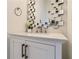 Stylish bathroom vanity with modern mirror, white countertop, and decorative accents at 490 Birkdale Dr, Fayetteville, GA 30215