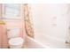 This charming bathroom has a tub and toilet at 11385 Donnington Dr, Duluth, GA 30097
