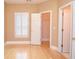 This bedroom has wood floors and bright white trim at 11385 Donnington Dr, Duluth, GA 30097
