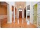 Stunning foyer with high ceilings, elegant columns, and a grand wooden front door at 11385 Donnington Dr, Duluth, GA 30097