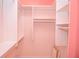 Walk-in closet offers customizable shelving for optimal organization at 11385 Donnington Dr, Duluth, GA 30097