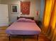 Cozy bedroom featuring a comfortable bed and ample natural light at 23 Poplar St, Porterdale, GA 30014