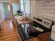 Well-equipped kitchen featuring modern appliances and lots of counterspace at 23 Poplar St, Porterdale, GA 30014