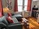 Cozy living area with windows and natural light at 23 Poplar St, Porterdale, GA 30014