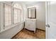 Charming bathroom with shuttered windows and decorative vanity at 3968 Belle Glade Ct, Snellville, GA 30039
